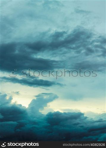 Dark cloudy sky, rain clouds - vertical format