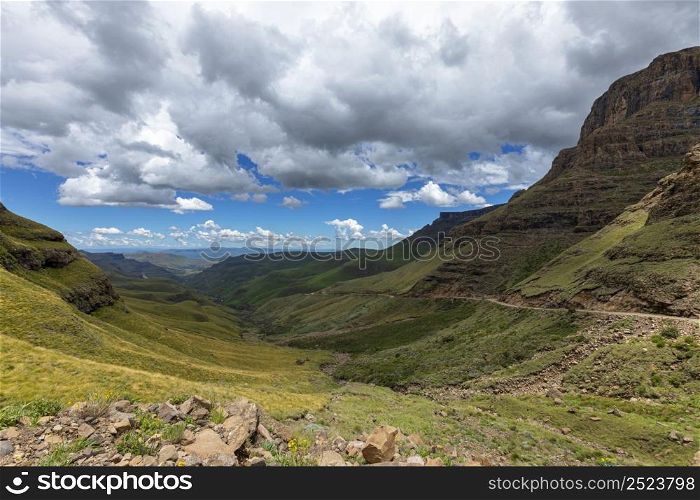 Dark cumulus clouds over the lower part of Sani Pass Drakensberg South Africa