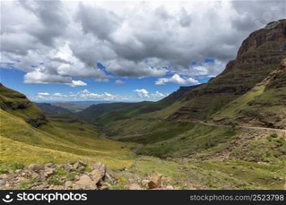Dark cumulus clouds over the lower part of Sani Pass Drakensberg South Africa