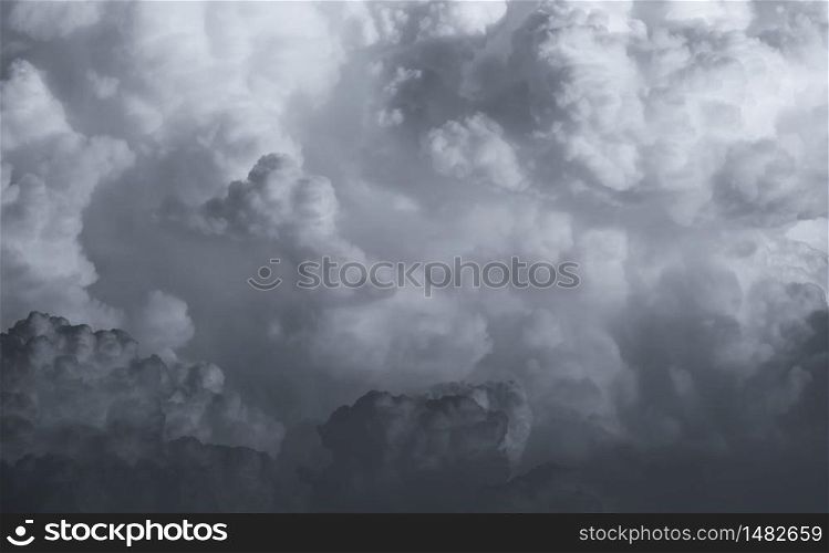 Dark dramatic sky and clouds. Background for death and sad concept. Gray sky and fluffy white clouds. Thunder and storm sky. Sad and moody sky. Nature background. Dead abstract background. Cloudscape.