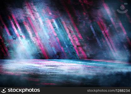 Dark empty stage, product showcase with futuristic multicolored rays of neon lights on wet asphalt and smoke.
