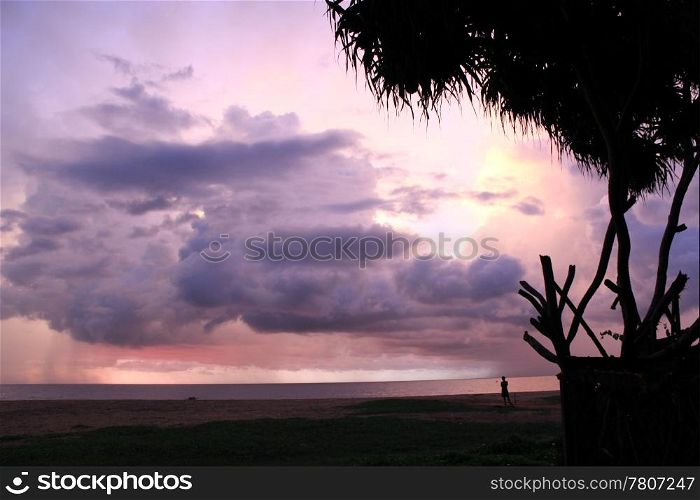Dark evening and clouds on the sea shore in Sri Lanka