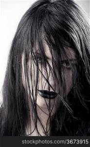 dark girl with black lips black hair and desaturate skin
