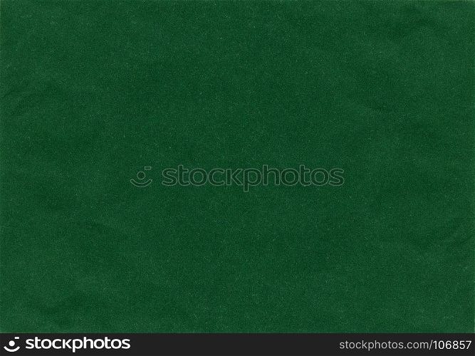 dark green paper texture background. dark green paper texture useful as a background
