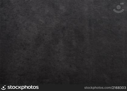 Dark grey concrete stone surface paint wall background, Grunge cement paint texture backdrop, Gray rough concrete stone wall background, Copy space for interior design background, banner, wallpaper