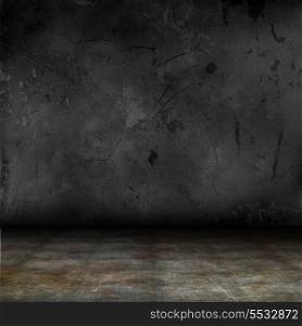 Dark interior with grunge concrete walls and floor