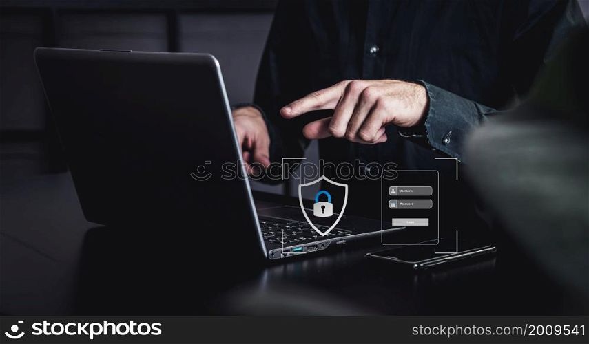 dark office with a businessman with login
