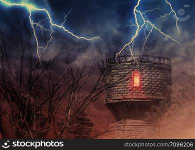 Dark old spooky tower and crooked tree branches at foggy night, photo manipulation.