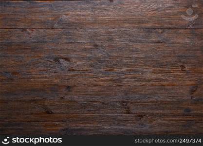 Dark old wooden planks table texture background top view
