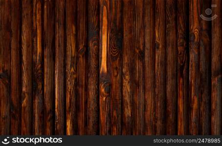 Dark old wooden table wide texture from vertical planks background top view