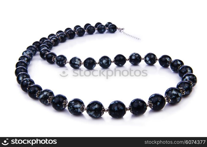 Dark pearl necklace isolated on the white