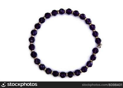 Dark pearl necklace isolated on the white