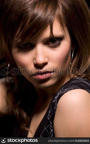dark picture of young beautiful woman face