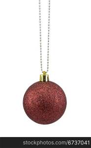 dark red christmas bauble over white background