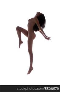 dark silhouette picture of dancing naked woman