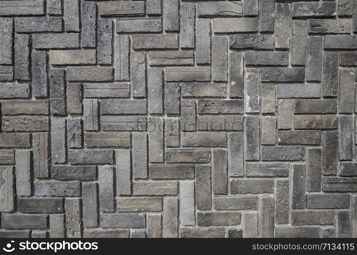 dark tone bricks wall for background design.