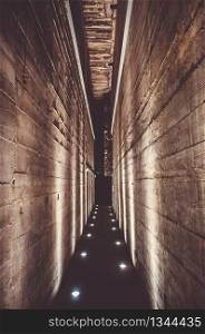 Dark tunnel corridor in a war bunker. Dark tunnel in a bunker