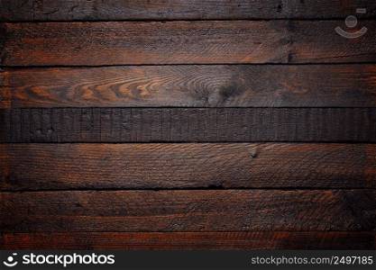 Dark wooden planks table background flatlay