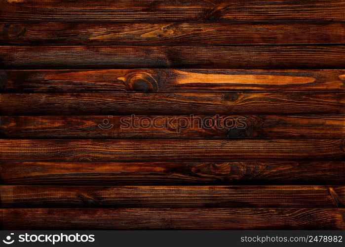 Dark wooden planks table texture background top view