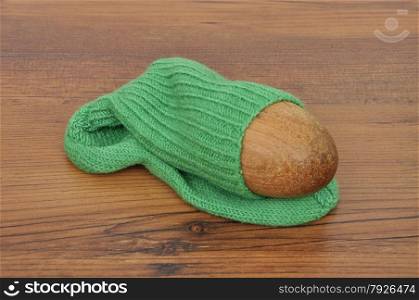 Darning egg with hand-knitted sock
