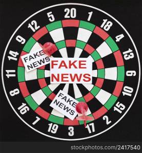 dartboard with fake news