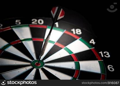Darts arrows in center target. Business and leisure concept. Many attempts to succeed theme.