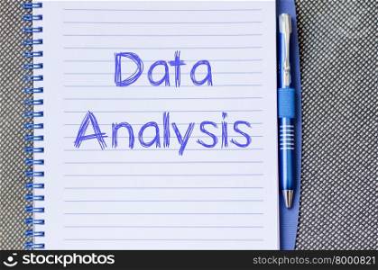 Data analysis text concept write on notebook with pen