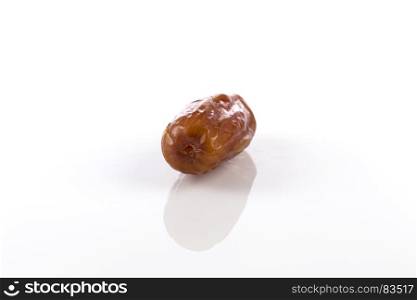 Date fruit close up isolated on a white background