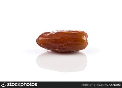Date fruit sweet close up isolated on a white background