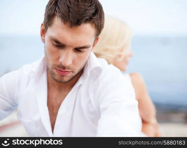 dating and relationships concept - stressed man with man outside