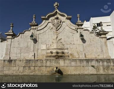 Dating from the 18th century, the Chafariz (public fountain) was built in late 18th century in gothic and baroque styles and features the coat of arms of the Portuguese Crown.
