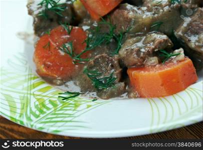 Daube stew - classic Provenca French stew made with inexpensive beef braised in wine, vegetables, garlic