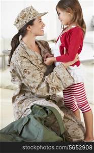 Daughter Greeting Military Mother Home On Leave
