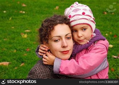 Daughter hugging her mother for a walk