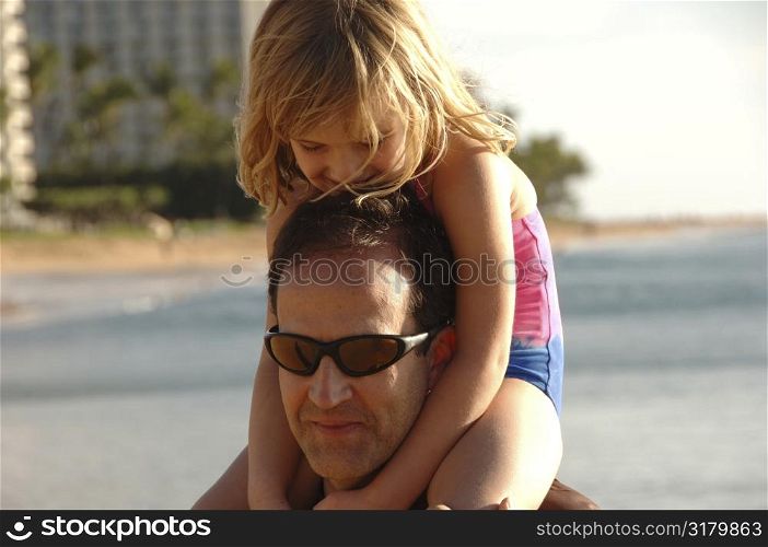 Daughter sitting on Dads shoulders