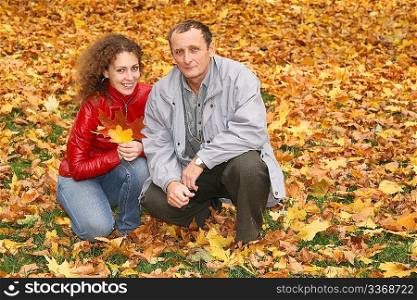 daughter with the father in the park in autumn
