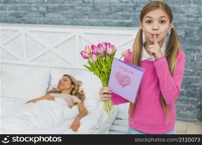 daughter with tulips greeting card holding finger lips