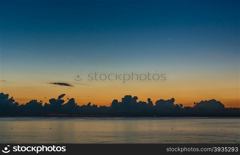 dawn at sea with clouds in a summer morning