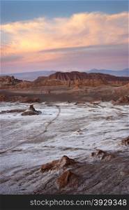 Dawn in the Valley of the Moon (Valle de la Luna), 13 kilometers west of San Pedro in the Cordillera de la Sal, in the Atacama desert, northern Chile. High concentrations of salt give a white covering layer to this area.