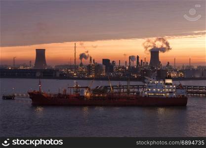 Dawn over the industrial skyline of the Humber Estuary near the city of Hull in northeast England.