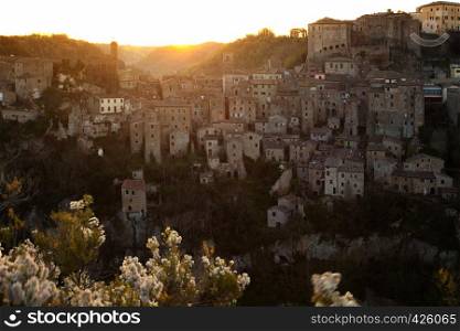 Dawn over the old famous tuff city of Sorano, province of Siena. Tuscany, Italy