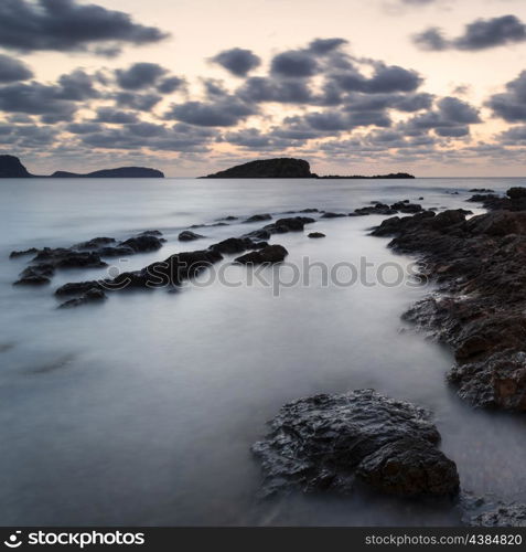 Dawn sunrise landscape over beautiful rocky coastline in Mediterranean Sea