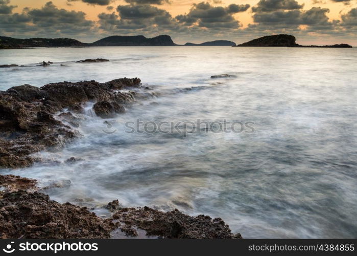 Dawn sunrise landscape over beautiful rocky coastline in Mediterranean Sea