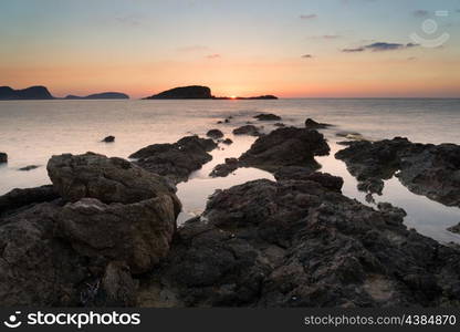 Dawn sunrise landscape over beautiful rocky coastline in Mediterranean Sea