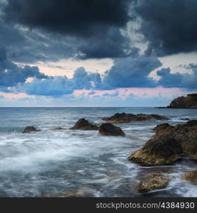 Dawn sunrise landscape over beautiful rocky coastline in Mediterranean Sea