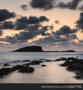 Dawn sunrise landscape over beautiful rocky coastline in Mediterranean Sea