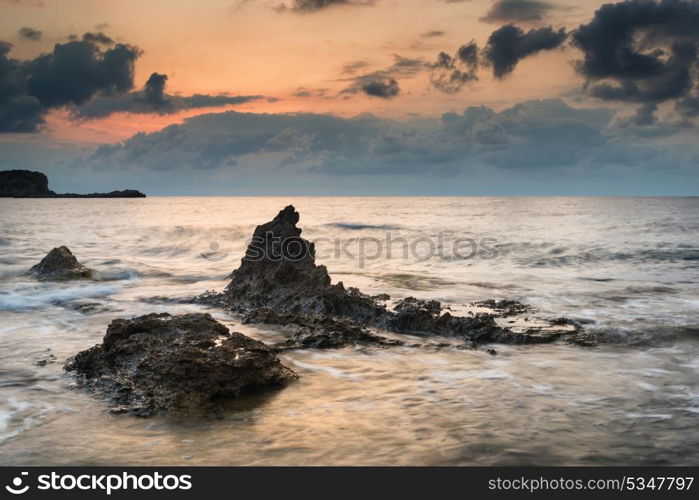 Dawn sunrise landscape over beautiful rocky coastline in Mediterranean Sea