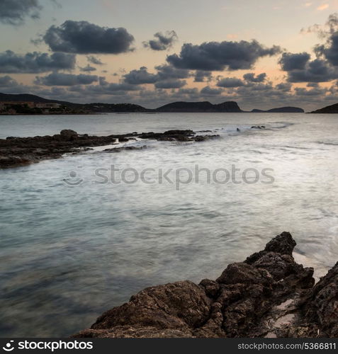 Dawn sunrise landscape over beautiful rocky coastline in Mediterranean Sea