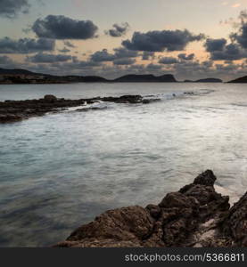 Dawn sunrise landscape over beautiful rocky coastline in Mediterranean Sea