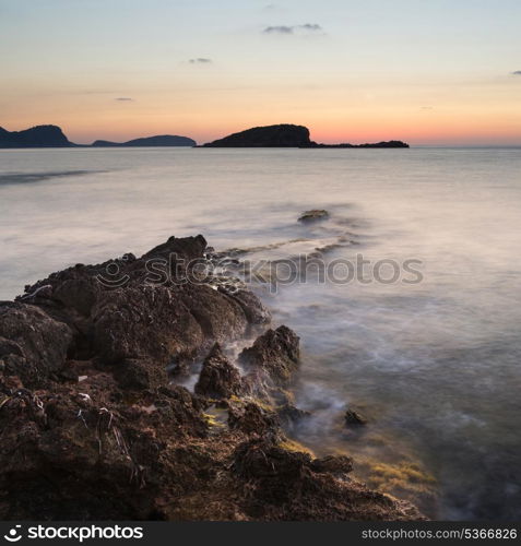 Dawn sunrise landscape over beautiful rocky coastline in Mediterranean Sea